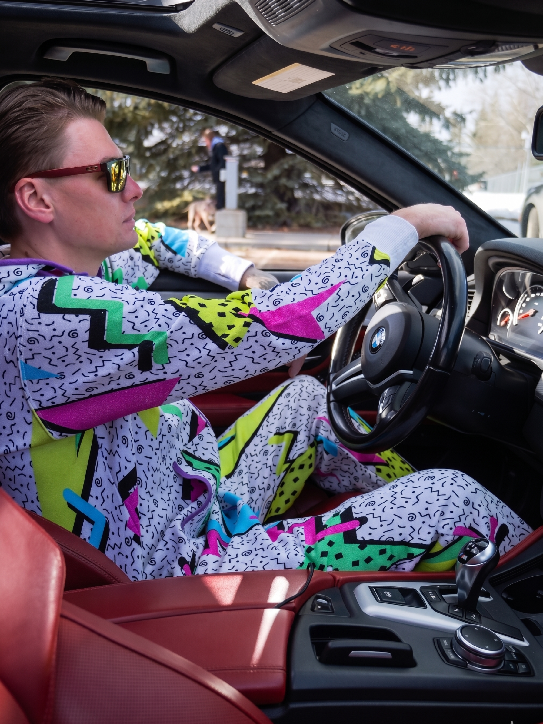 Retro 86' – retro eighties colorful ski print onesie – lifestyle photo | Unichill adult unisex jumpsuit designed in Calgary