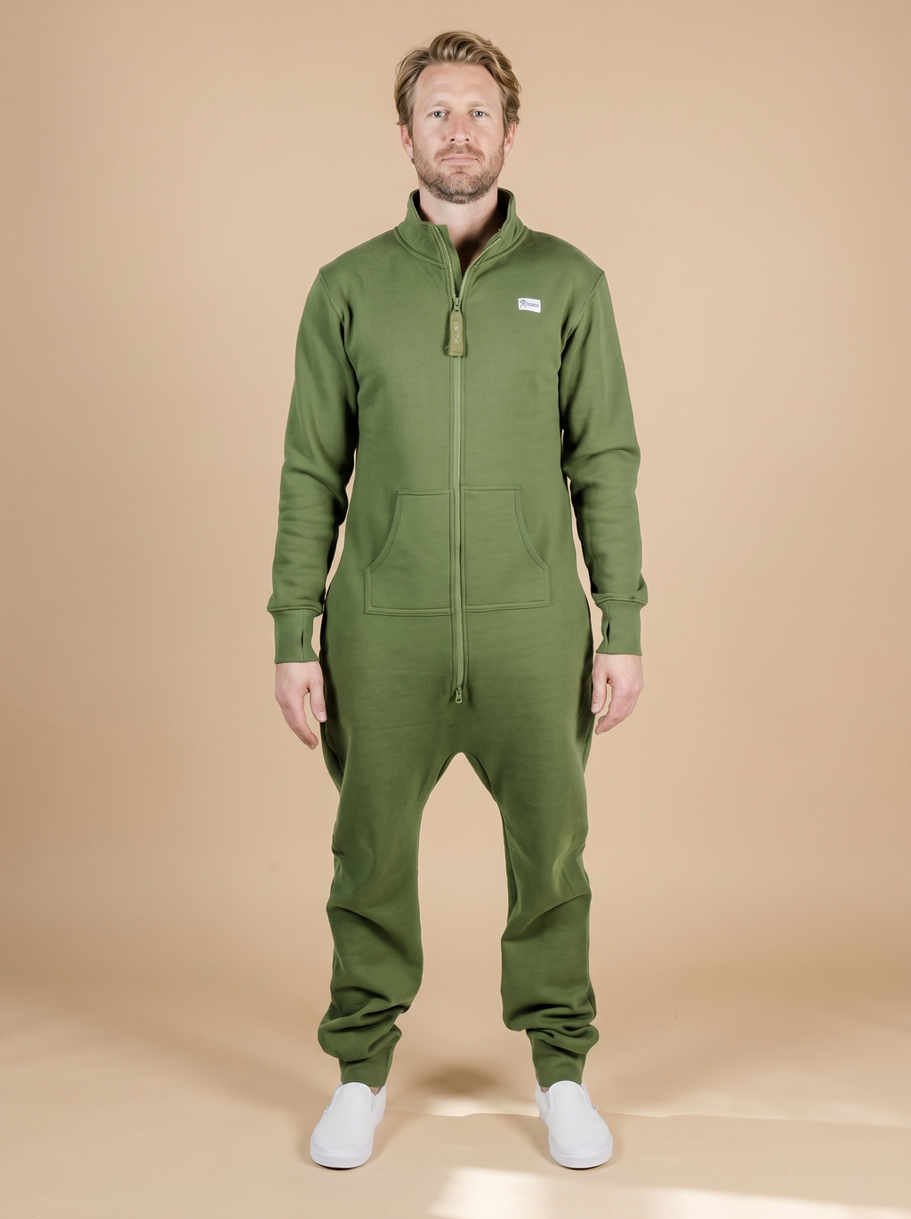 Evergreen Zip-Up, green hoodless fleece onesie, front view on a man | Unichill adult unisex jumpsuit designed in Calgary