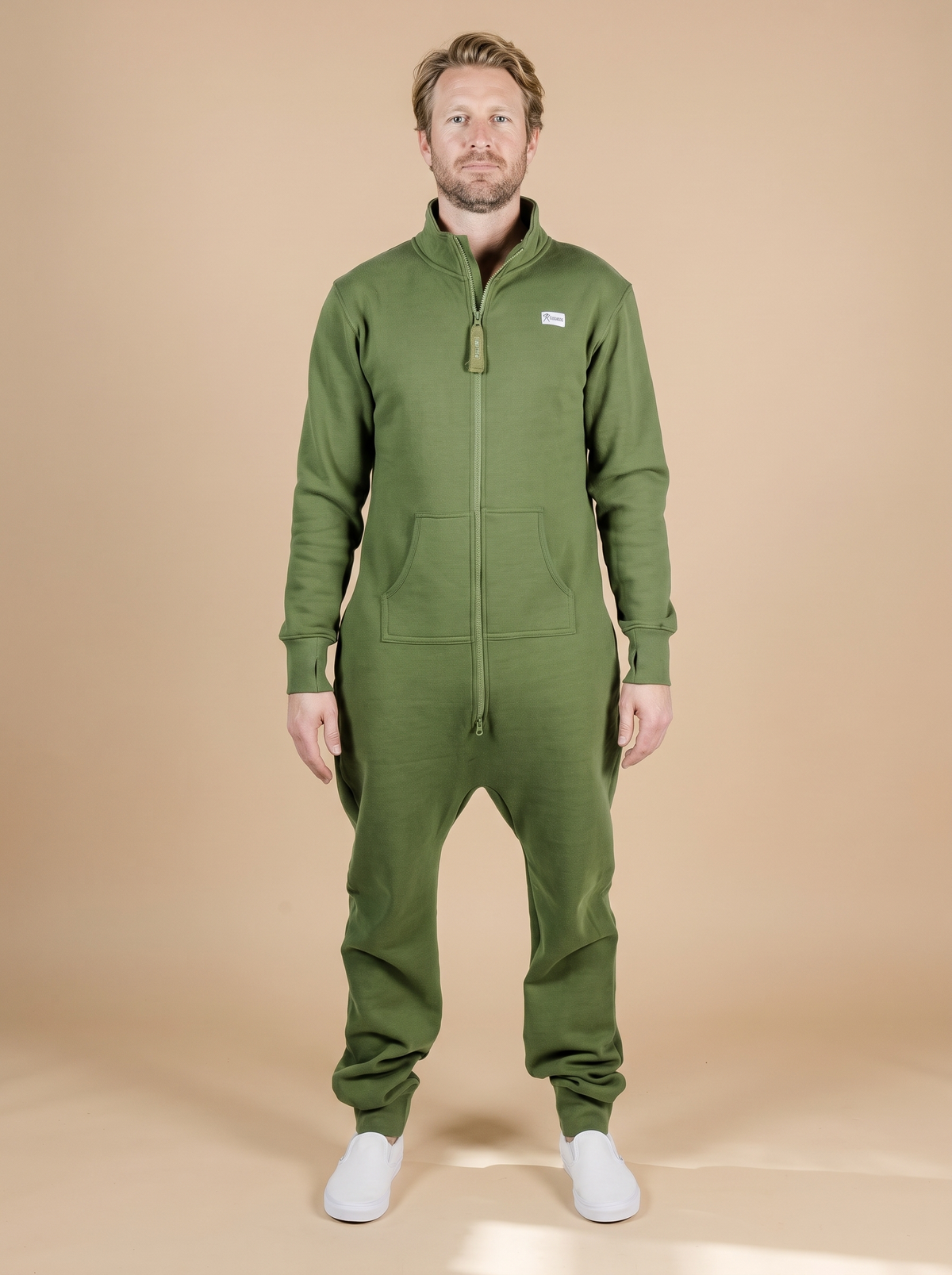 Evergreen Zip-Up, green hoodless fleece onesie, front view on a man | Unichill adult unisex jumpsuit designed in Calgary