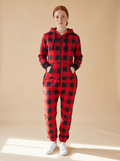 Buffalo Plaid, red and black buffalo check onesie, front view on a woman | Unichill adult unisex jumpsuit designed in Calgary