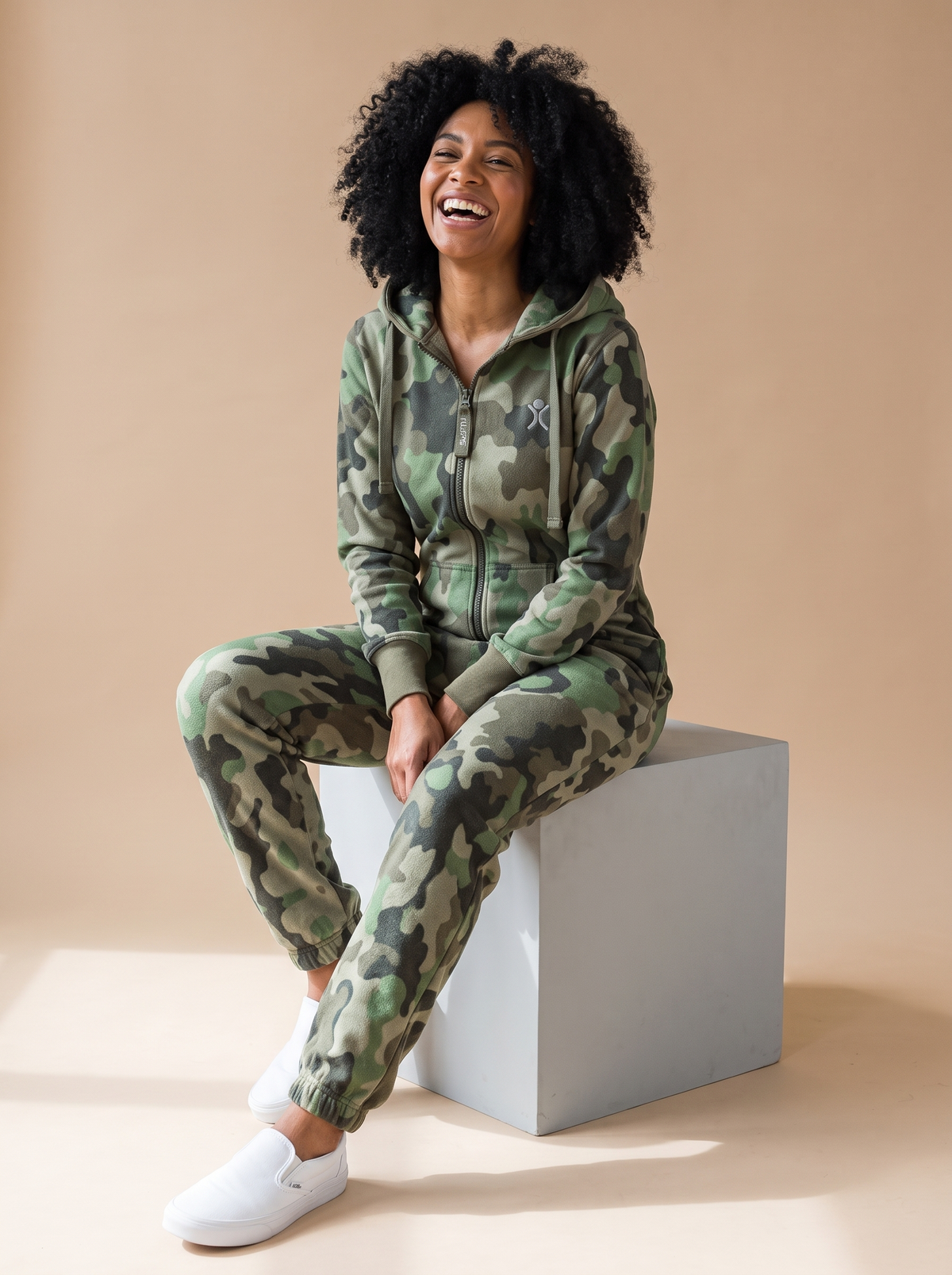 Camo Green, green camouflage print onesie, lifestyle photo | Unichill adult unisex jumpsuit designed in Calgary