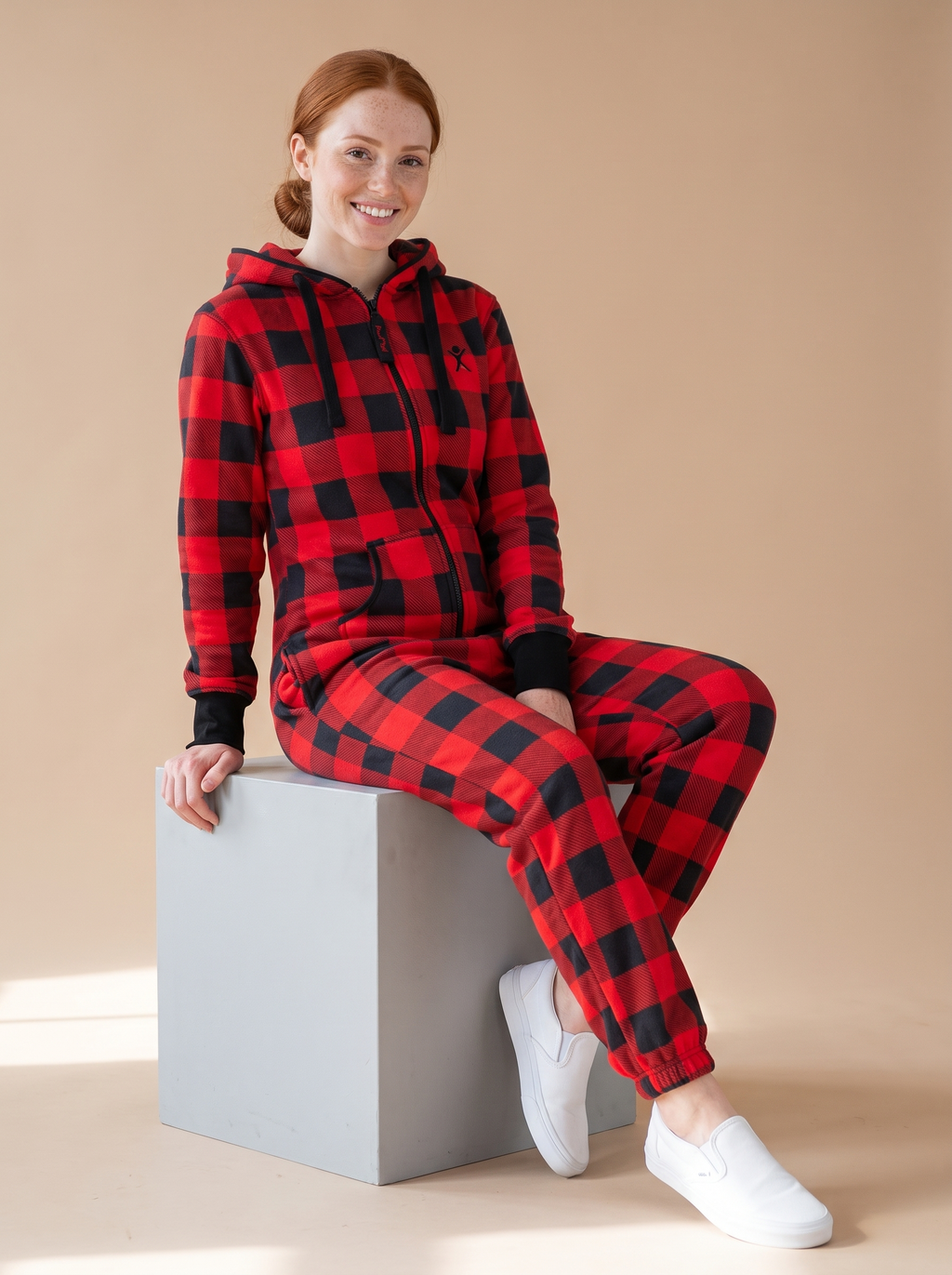 Buffalo Plaid, red and black buffalo check onesie, lifestyle photo | Unichill adult unisex jumpsuit designed in Calgary