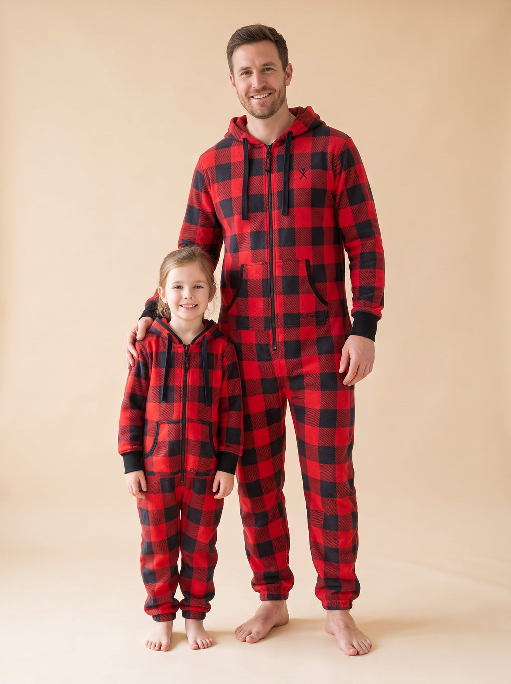 Matching Buffalo Plaid onesies for adults and kids