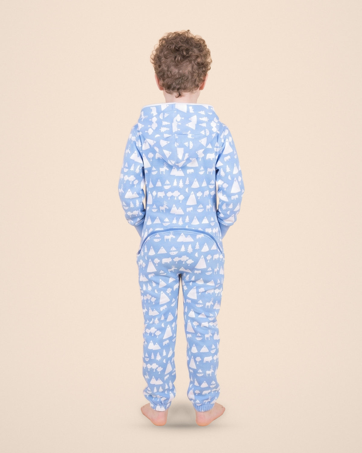 Cloud9 Kids, blue cloud and mountain print kids onesie, Matthew Langille collaboration, back view | Unichill kids onesie designed in Calgary