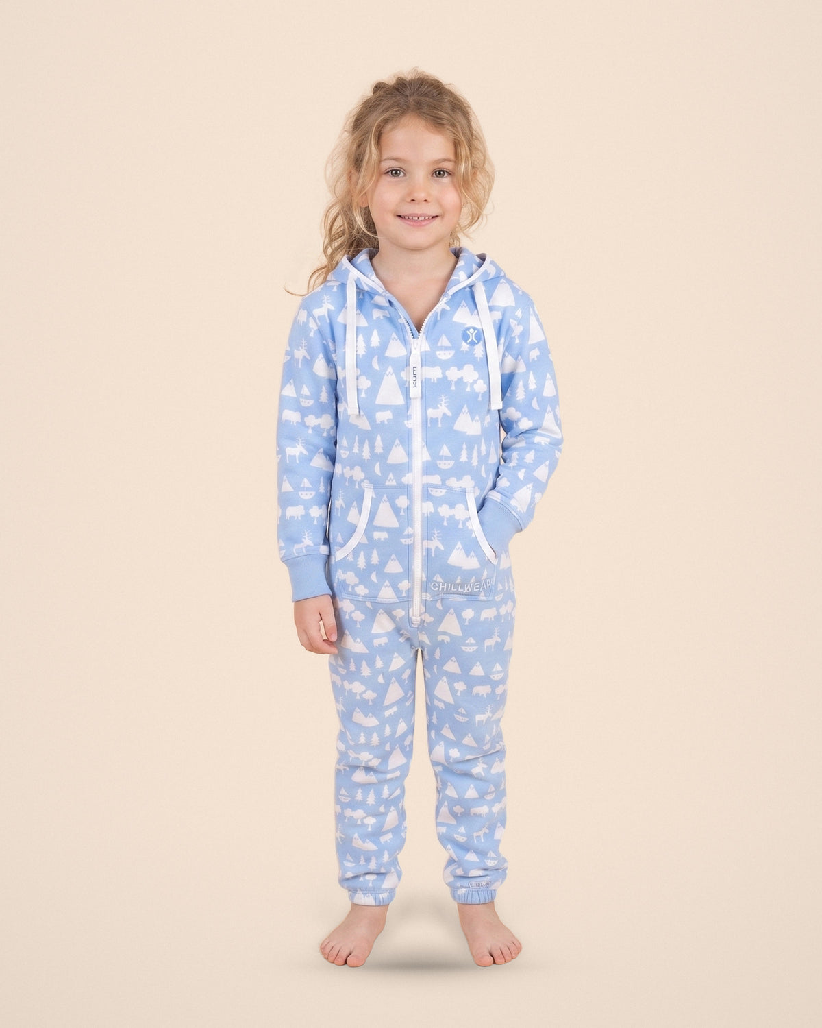 Cloud9 Kids, blue cloud and mountain print kids onesie, Matthew Langille collaboration, front view | Unichill kids onesie designed in Calgary