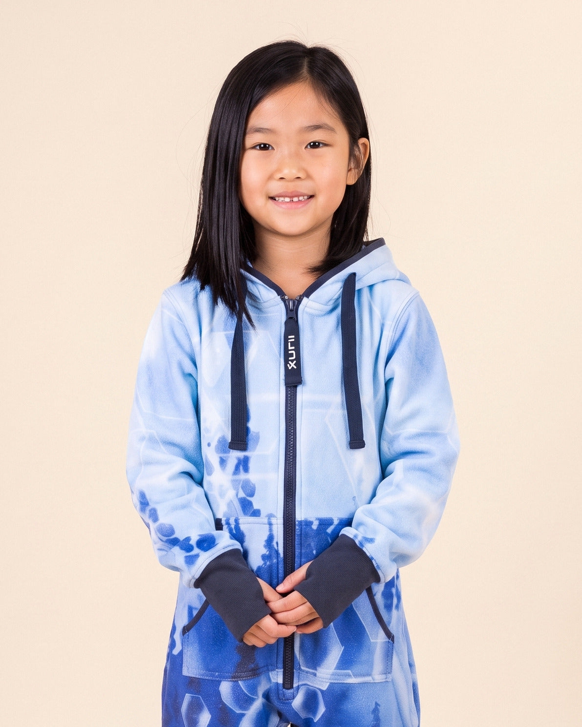 Ice Gems Kids, ice blue crystal gem print kids onesie, Valerie Black collaboration, close-up of the hood, zipper and print | Unichill kids onesie designed in Calgary