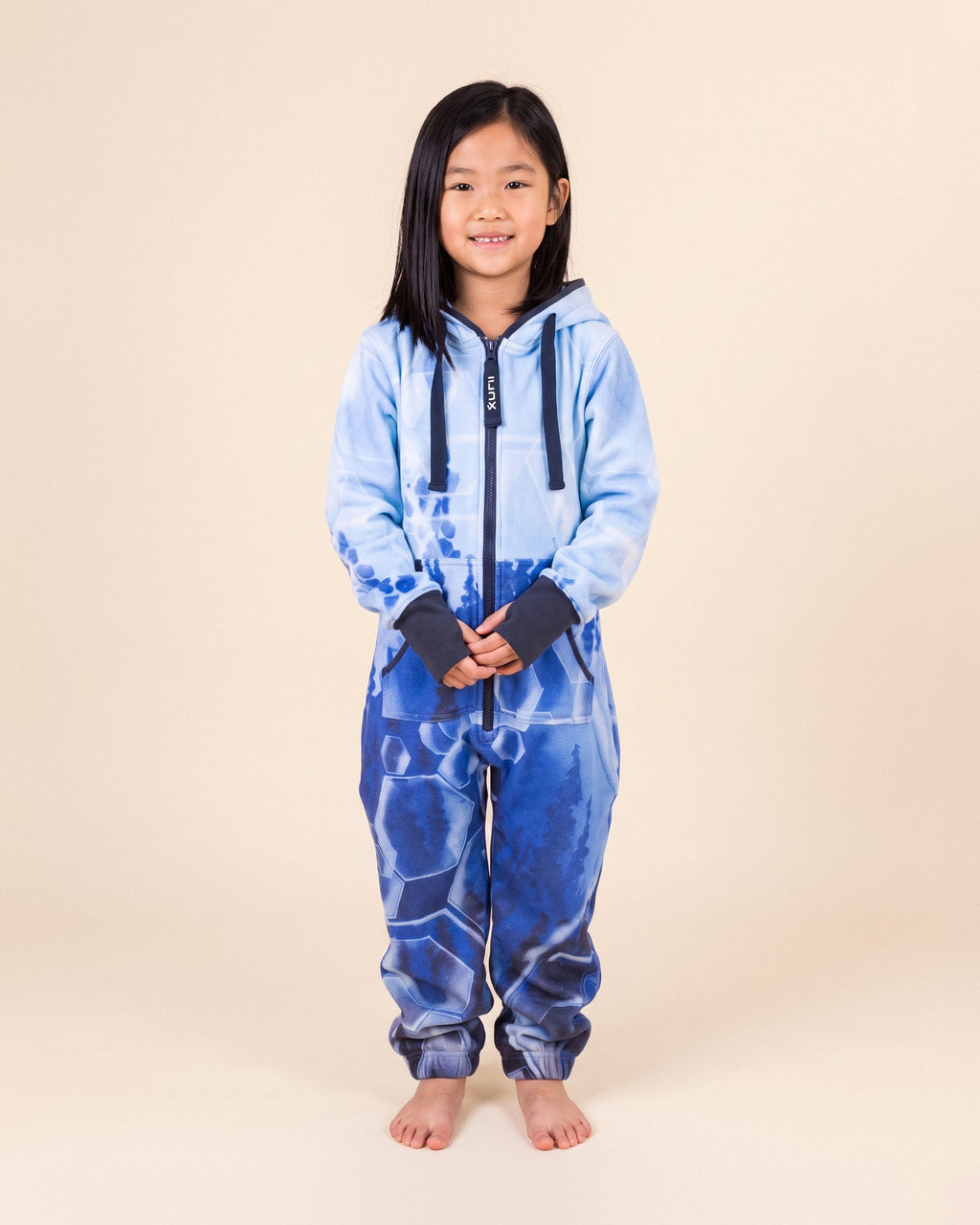 Ice Gems Kids, ice blue crystal gem print kids onesie, Valerie Black collaboration, front view | Unichill kids onesie designed in Calgary