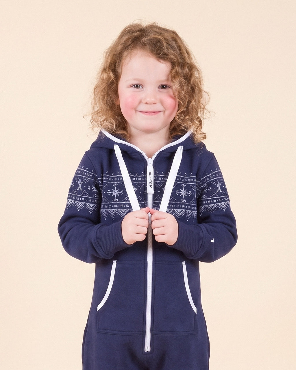 Nordic Navy Kids, navy kids onesie with a white Nordic snowflake band, close-up of the hood, zipper and print | Unichill kids onesie designed in Calgary