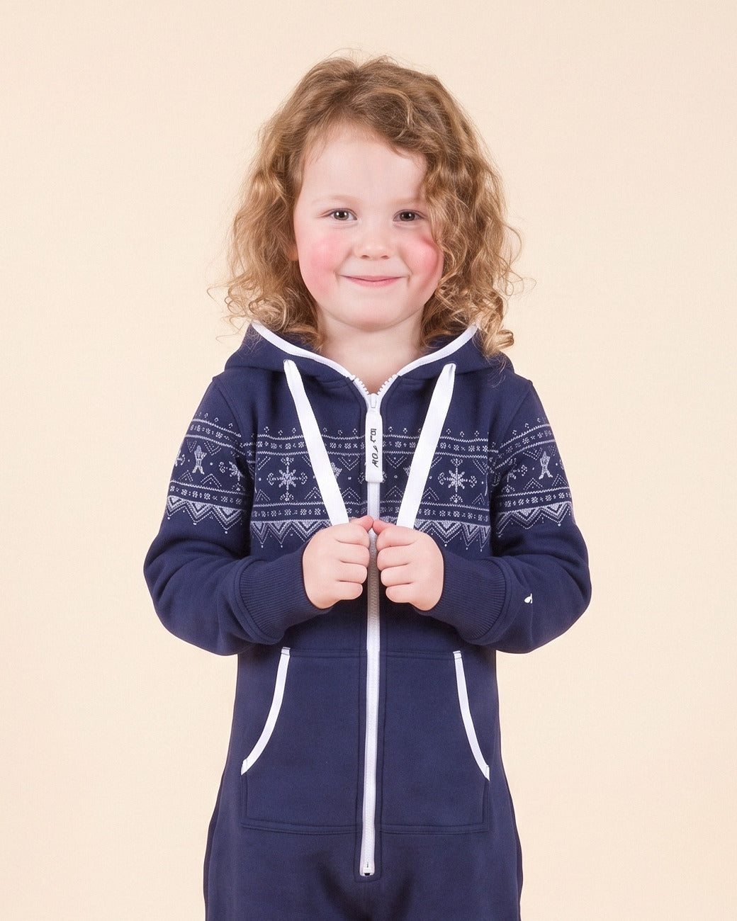 Nordic Navy Kids, navy kids onesie with a white Nordic snowflake band, close-up of the hood, zipper and print | Unichill kids onesie designed in Calgary