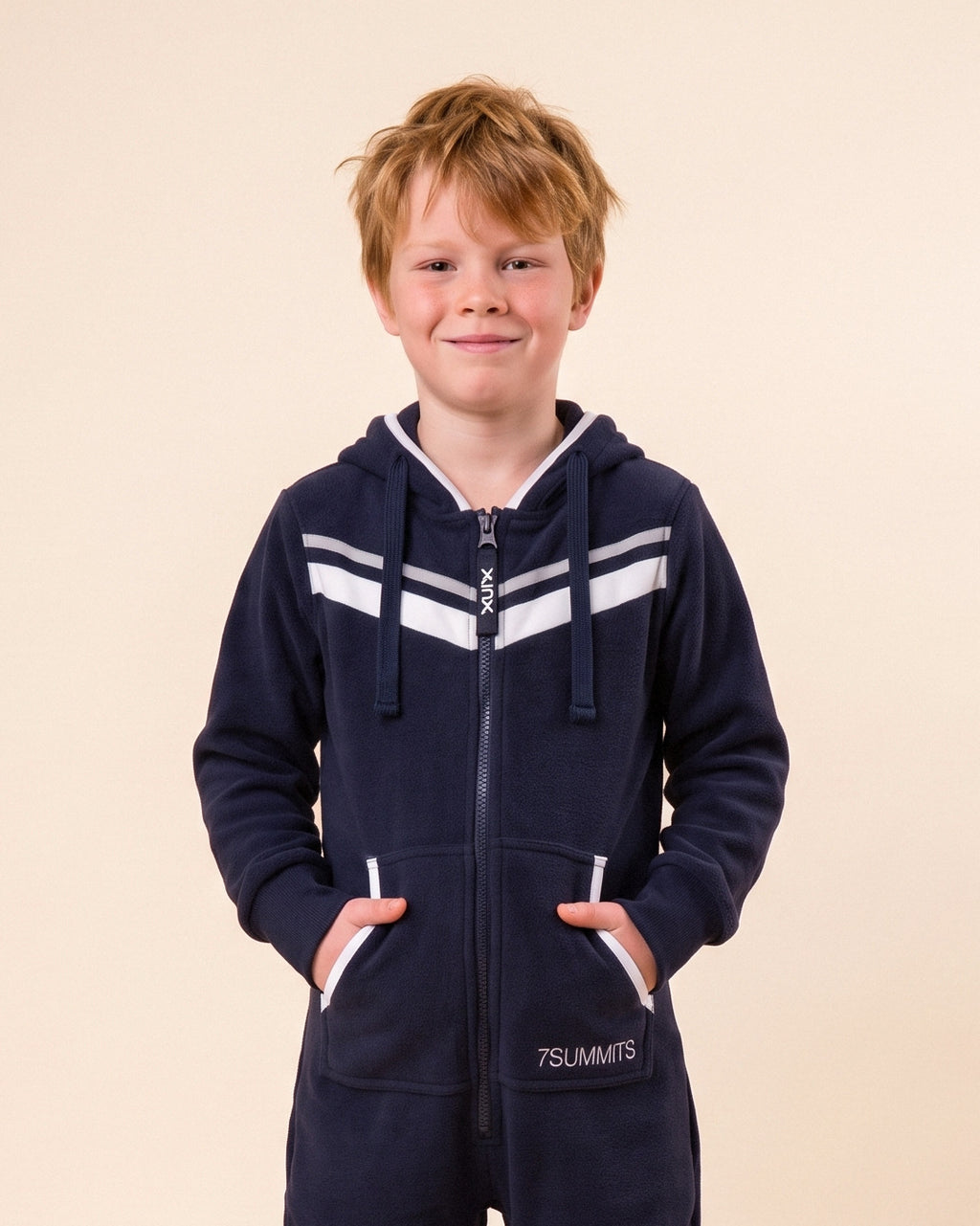7Summits Kids, navy kids onesie with white chevron stripes, 7Summits x Mike Hamill collaboration, close-up of the hood, zipper and print | Unichill kids onesie designed in Calgary