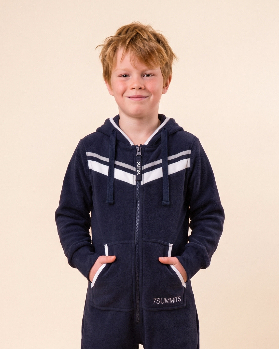 7Summits Kids, navy kids onesie with white chevron stripes, 7Summits x Mike Hamill collaboration, close-up of the hood, zipper and print | Unichill kids onesie designed in Calgary