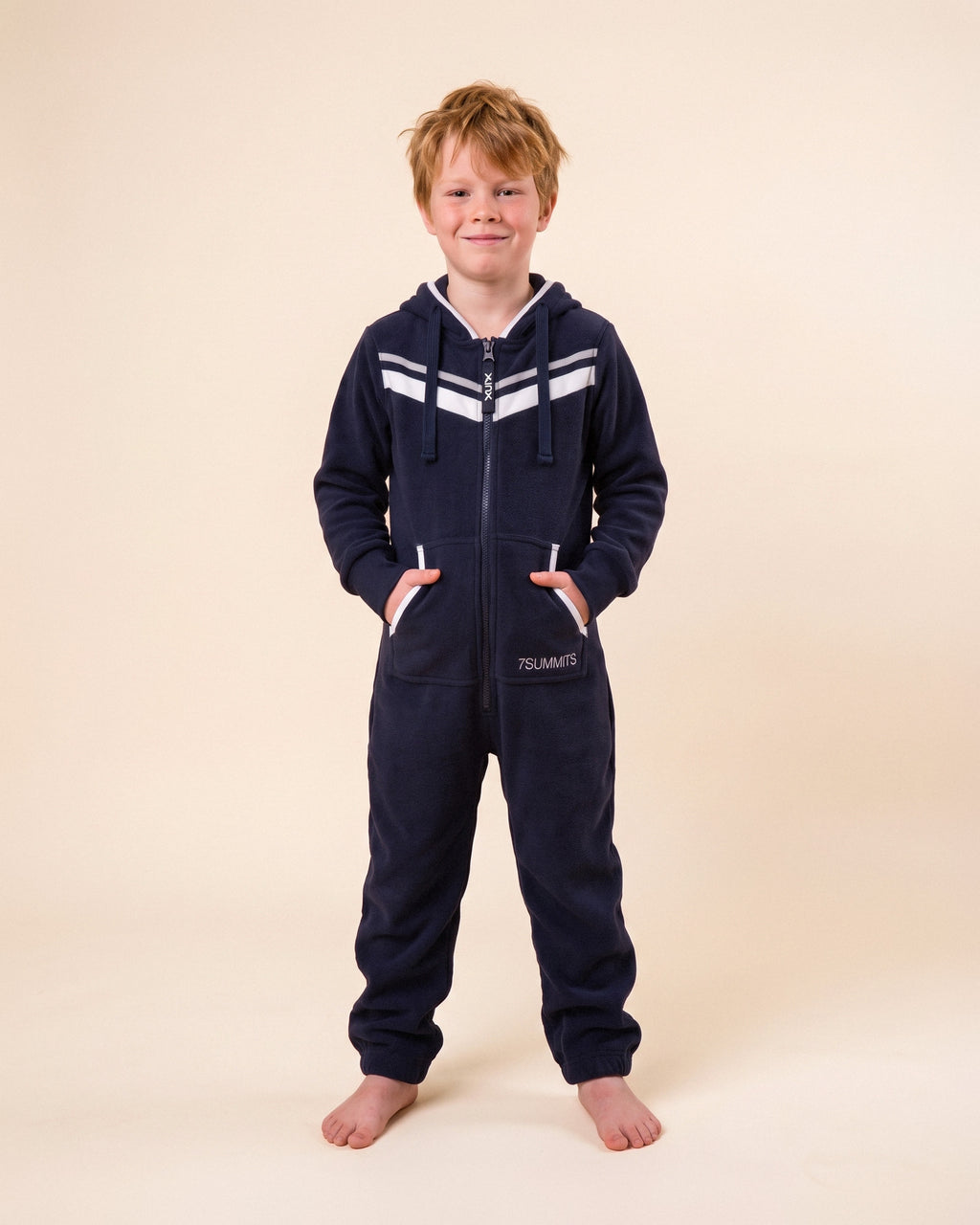 7Summits Kids, navy kids onesie with white chevron stripes, 7Summits x Mike Hamill collaboration, front view | Unichill kids onesie designed in Calgary