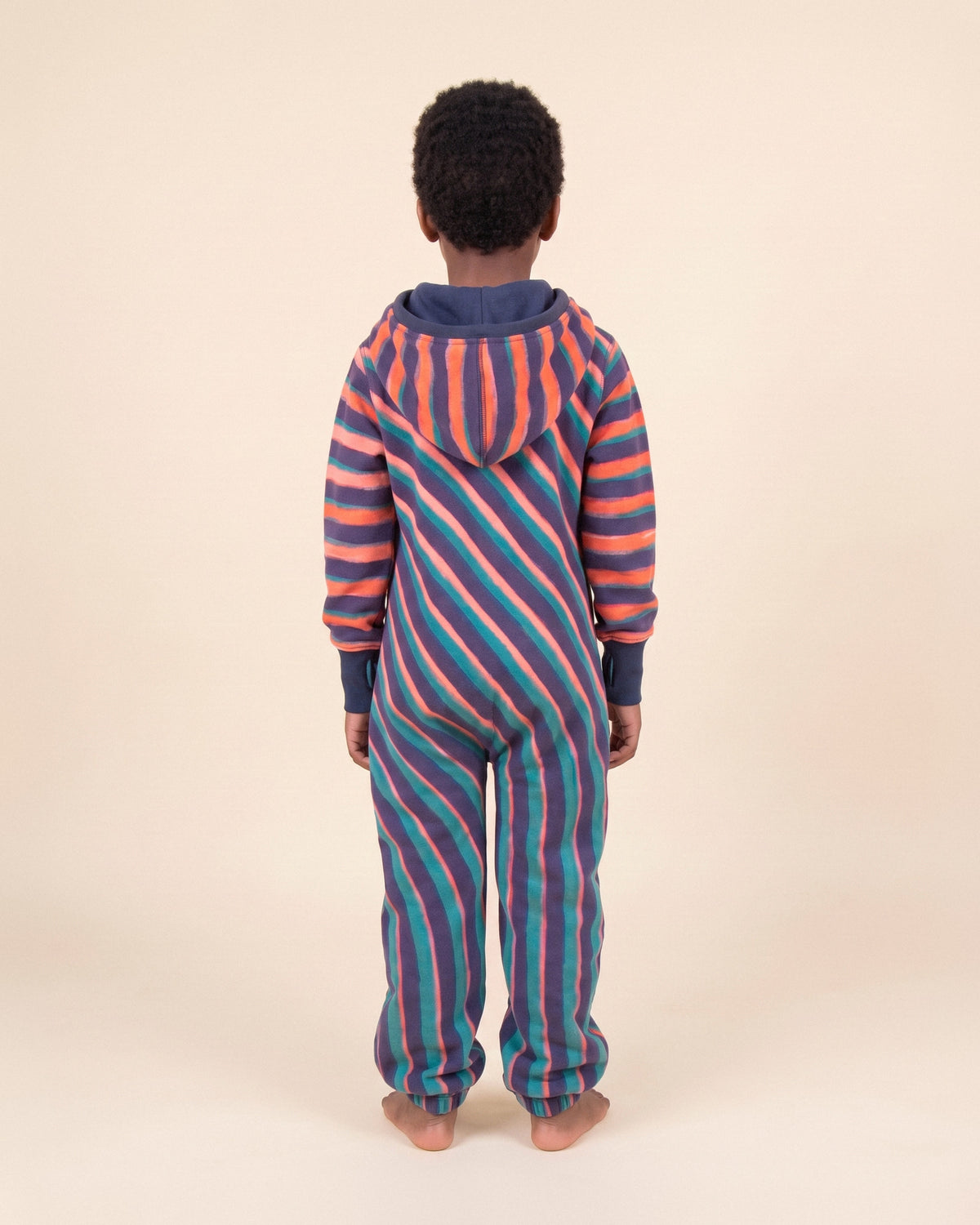 Vinyl Kids, coral, navy and teal diagonal stripe kids onesie, Rhys Douglas Farrell collaboration, back view | Unichill kids onesie designed in Calgary