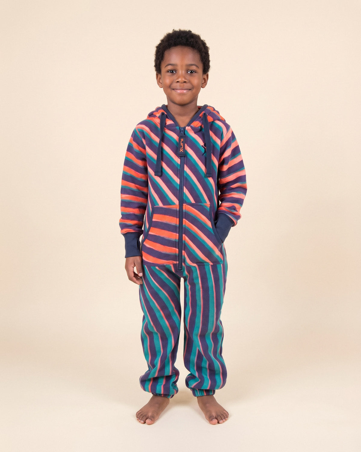 Vinyl Kids, coral, navy and teal diagonal stripe kids onesie, Rhys Douglas Farrell collaboration, front view | Unichill kids onesie designed in Calgary