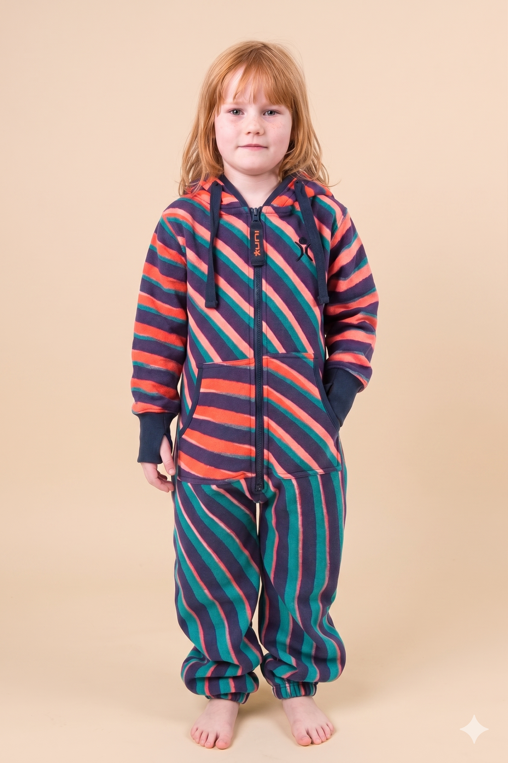 Vinyl Kids – geometric op-art colorful print kids onesie, Rhys Douglas Farrell collaboration – front view | Unichill kids jumpsuit designed in Calgary